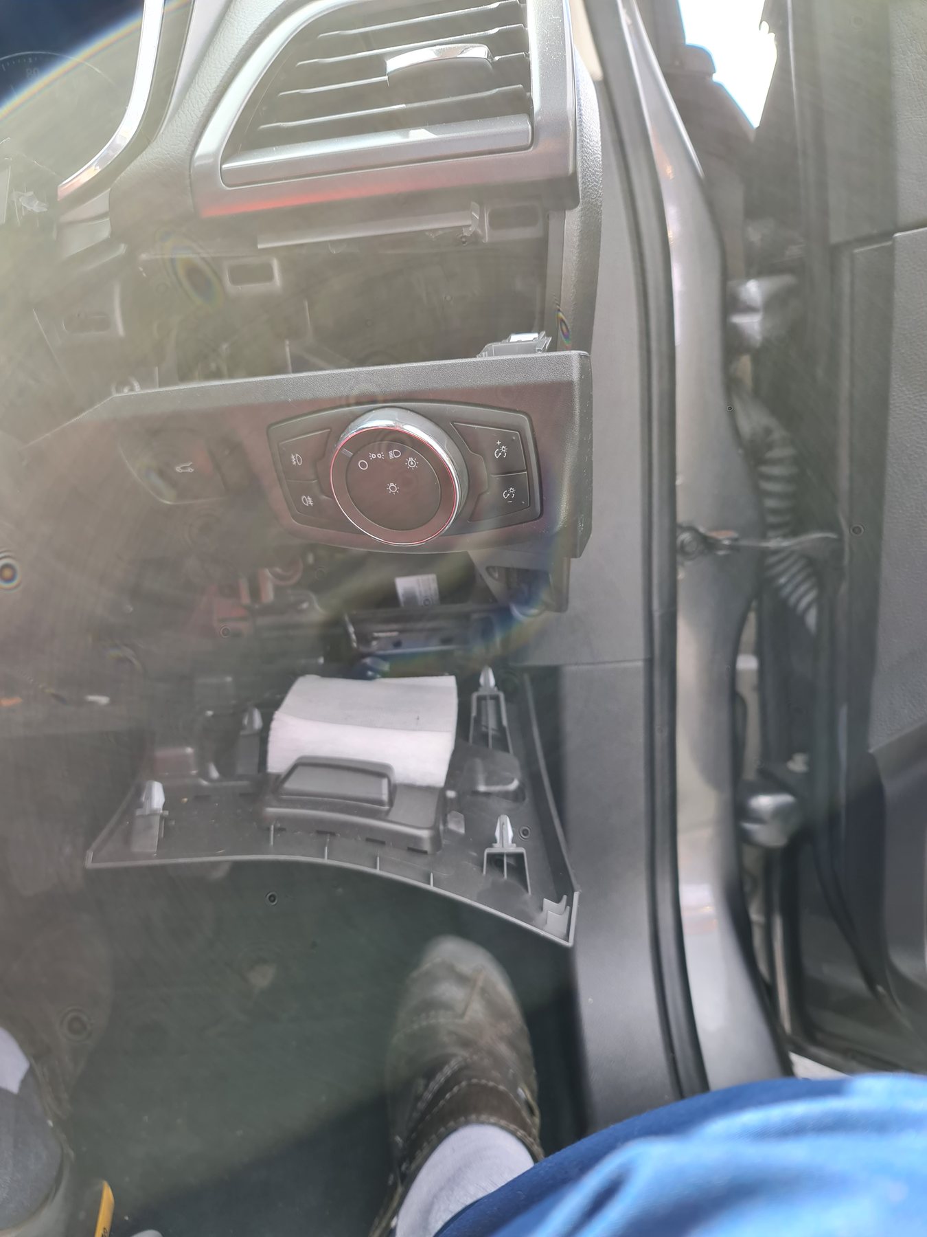 Console retrofit work on a Ford vehicle