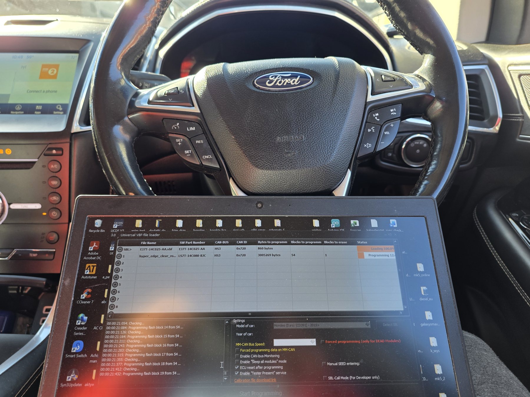 Vehicle retrofit work on a Ford vehicle